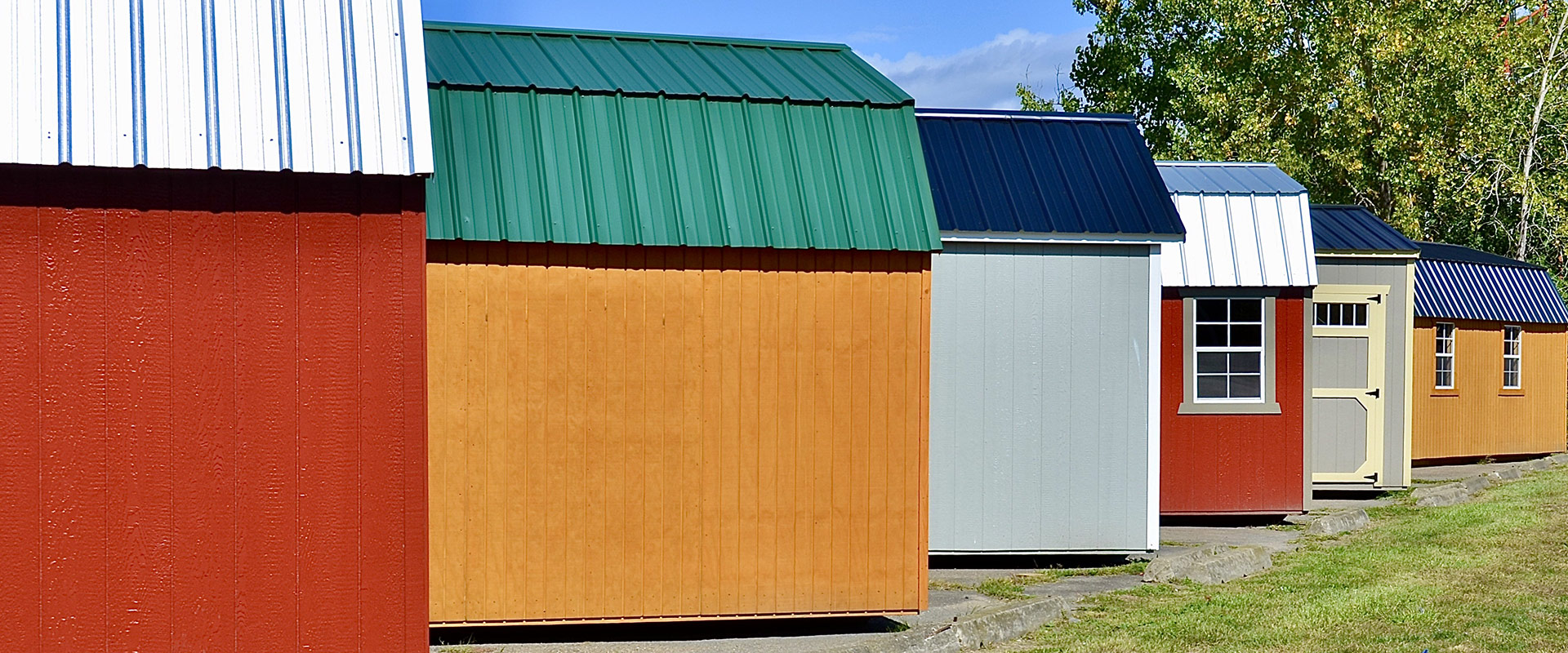 Colorful sheds and barns on a dealer lot